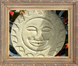 carved stone sun wall mount